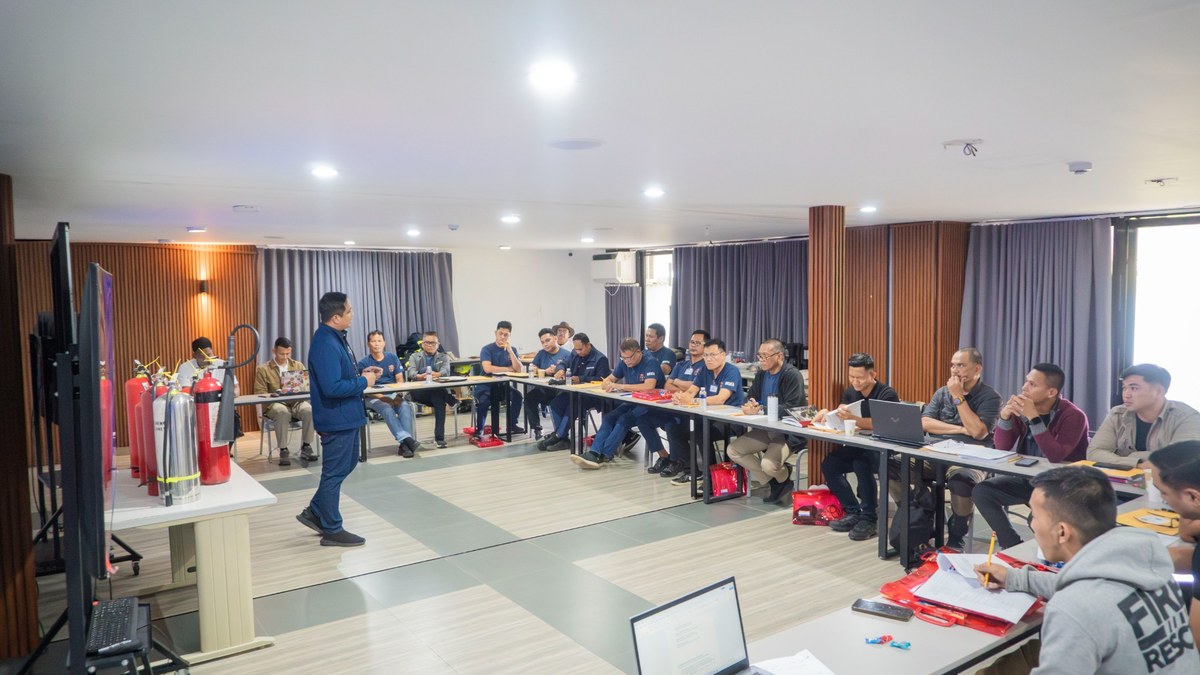 Participants engaged in focused classroom learning at COMPASS Safety Institute
